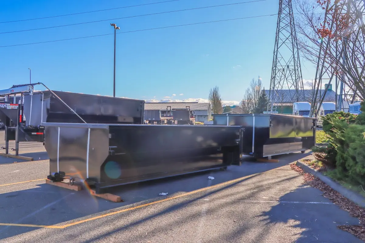 Roll-off dumpster ready for waste disposal at job site for 12 Yard Dumpster Rental in Salisbury
